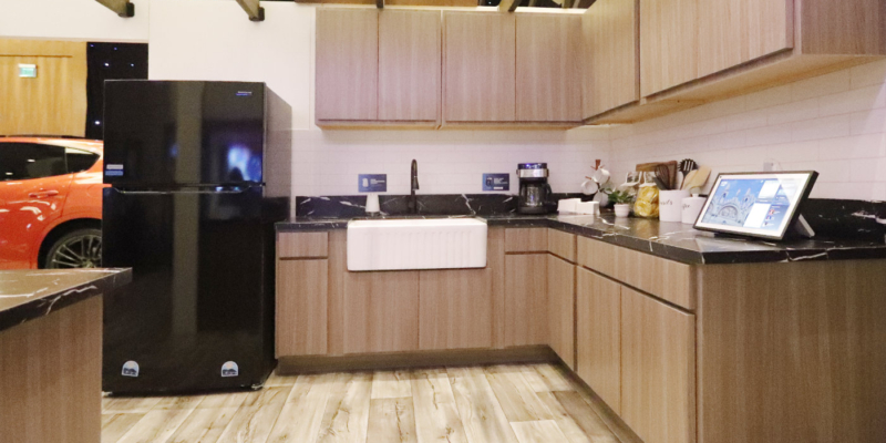 A kitchen with various Alexa tech powering it