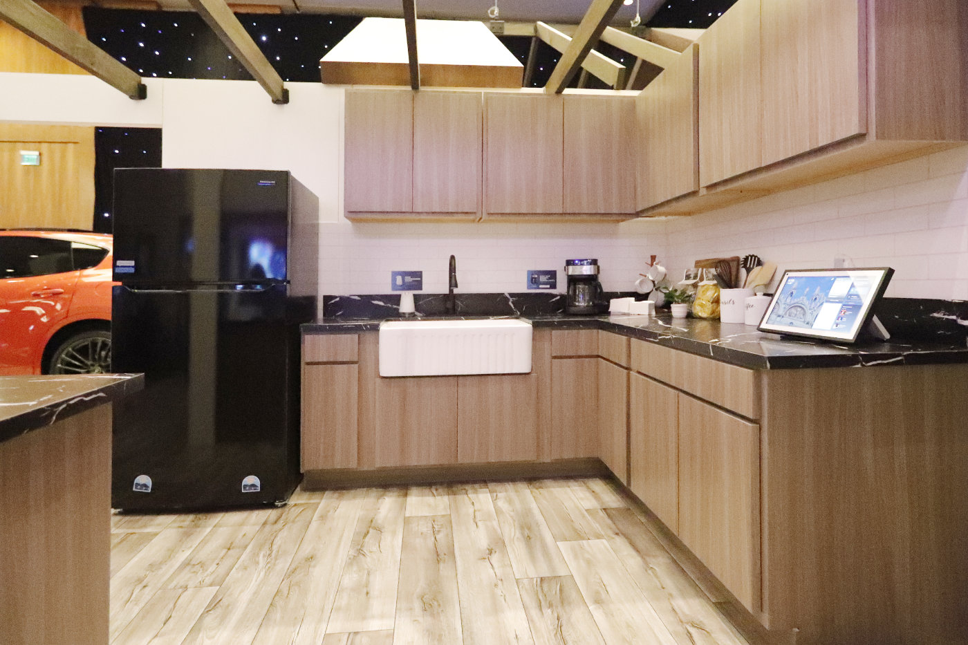 A kitchen with various Alexa tech powering it