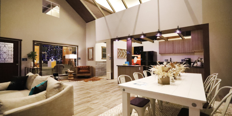 Wideshot of the kitchen, living room, and dining room